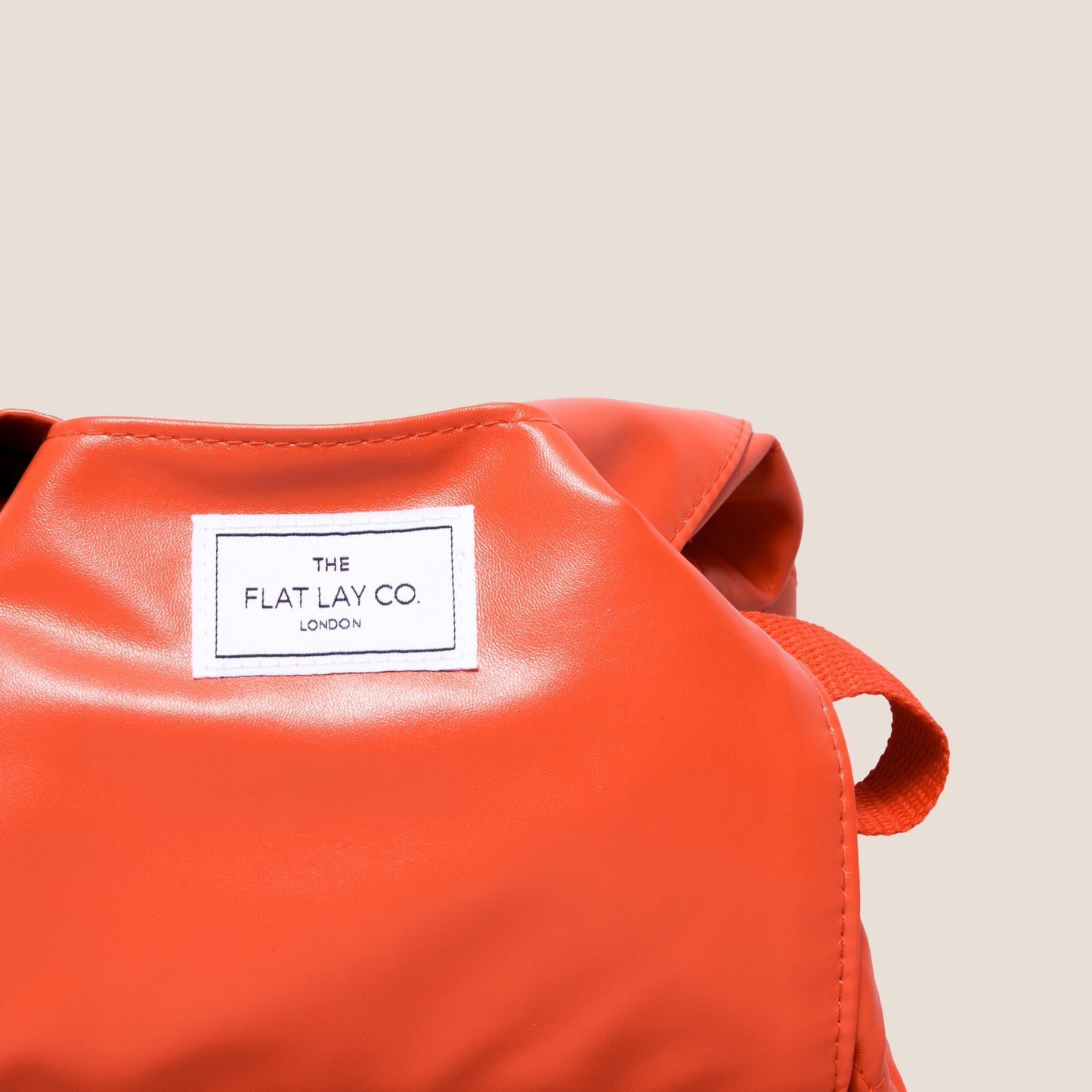 Monochrome Orange Leather Full Size Flat Lay Makeup Bag