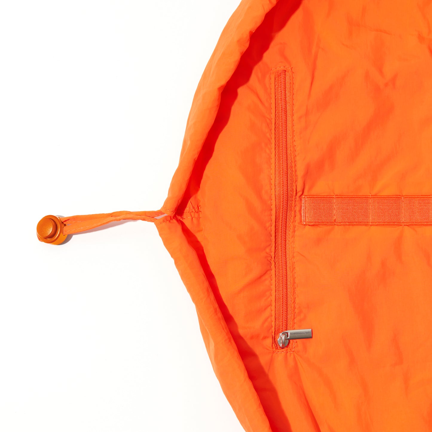 The Flat Lay Co. Drawstring Makeup Bag in Orange Parachute