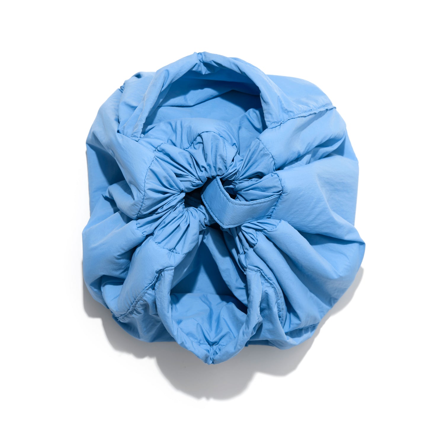 The Flat Lay Co. Drawstring Makeup Bag in Blue Parachute